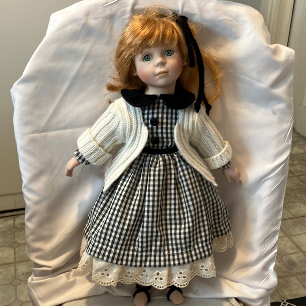 Lovely. vintage 17” doll with red hair ! Porcelain face n hands n legs. Nicely